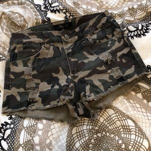 Distressed camo shorts